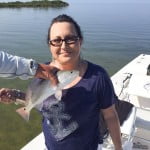 Holding a caught fish